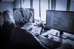 Heavy equipment dispatcher scheduling a job. 