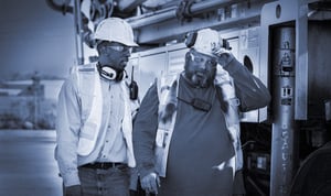 Operators preparing for heavy equipment job